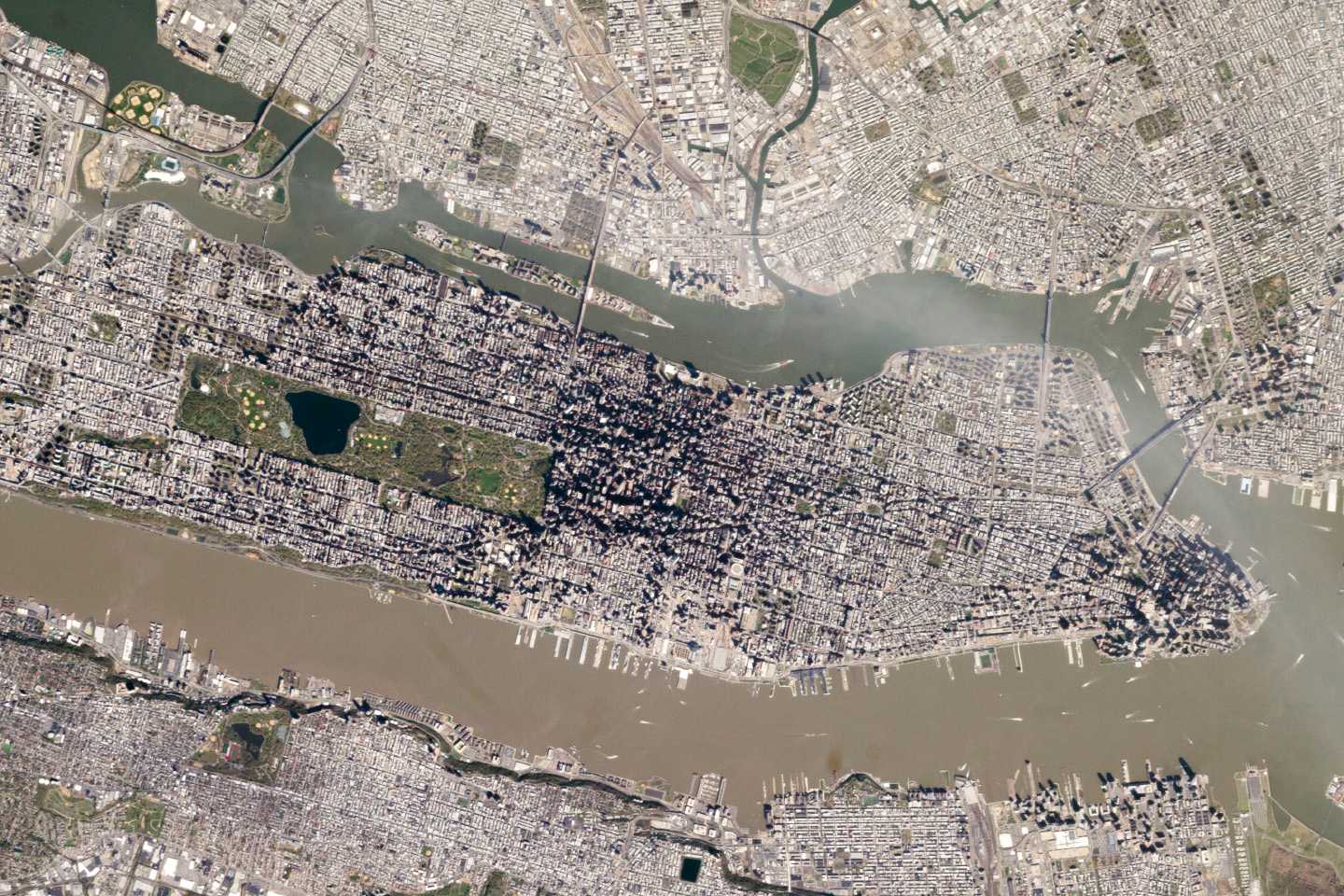 The narrow island of Manhattan, located between the Hudson River and the East River. (Photography courtesy NASA/GSFC)